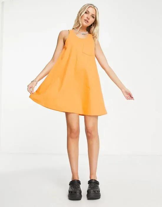 COLLUSION denim swing dress in orange