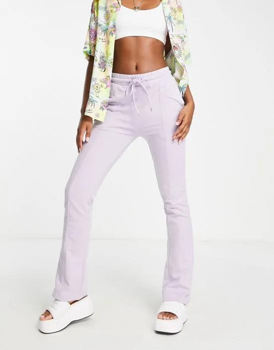 COLLUSION flared sweatpants in lilac