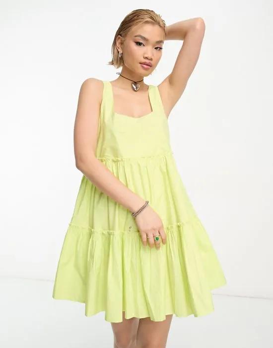 COLLUSION tiered volume mini dress in lime