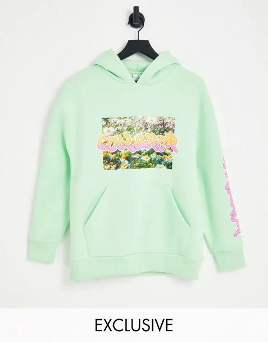 COLLUSION warped branded print hoodie in light green