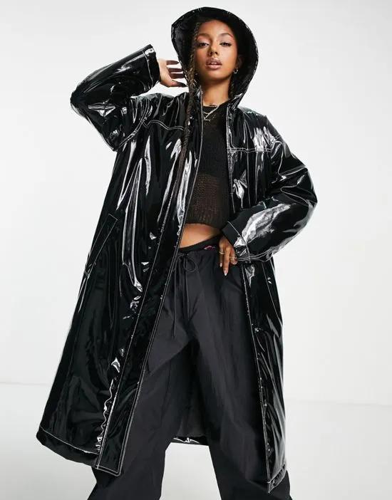 contrast stitch high shine rain jacket in black