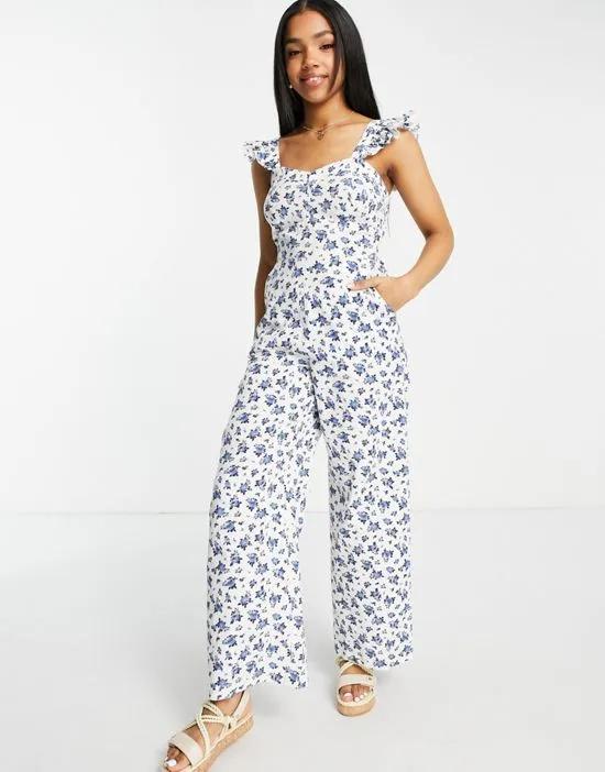 cotton flax frill strap jumpsuit in ivory ditsy