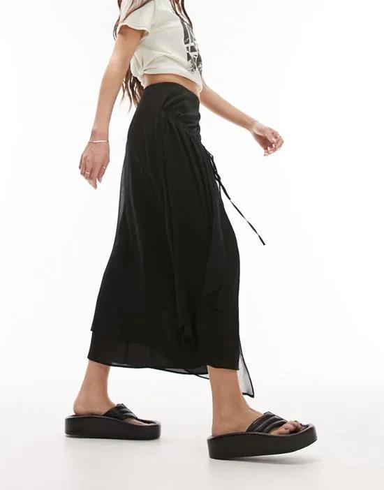 crinkle yoryu asymmetric soft midi skirt in black