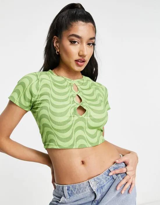 crop t-shirt with cut out detail in green wavy print