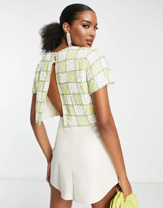 cropped open back t-shirt in lime sequin checkerboard