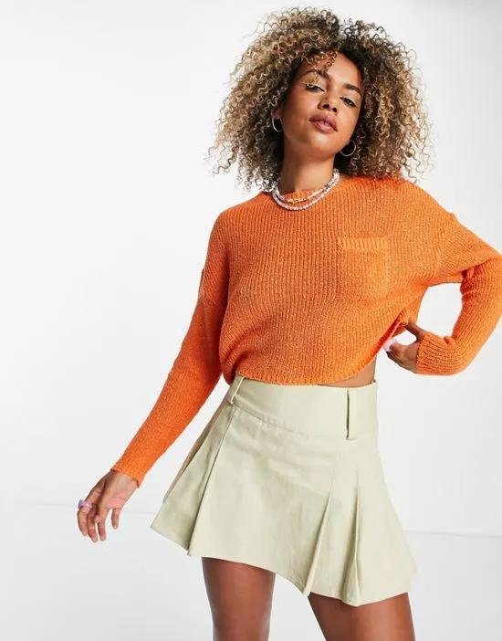 cropped sweater with pocket in orange