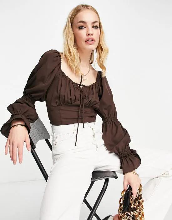 cropped top with tie front in brown
