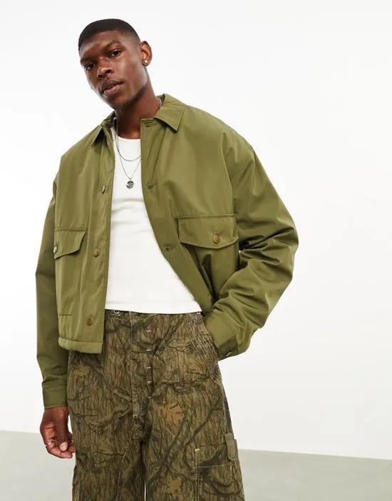 cropped worker jacket with teddy lining in green