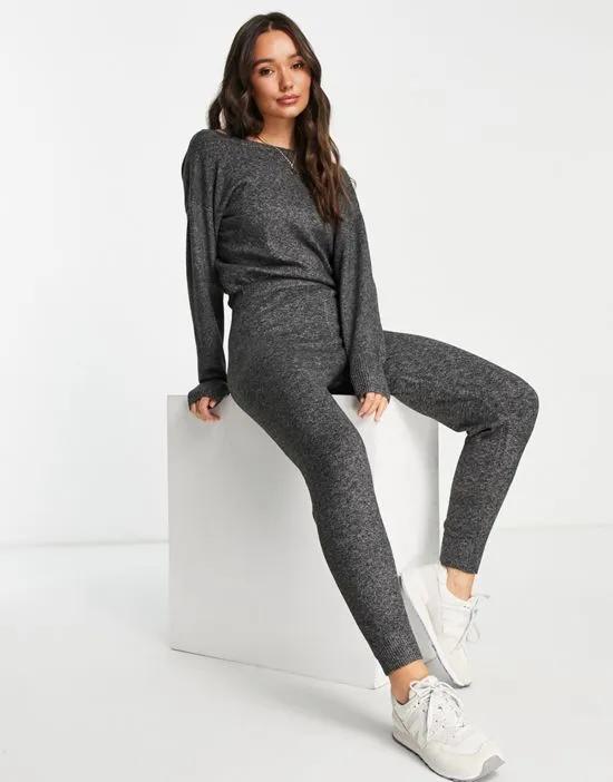 cross-back jumpsuit in charcoal gray