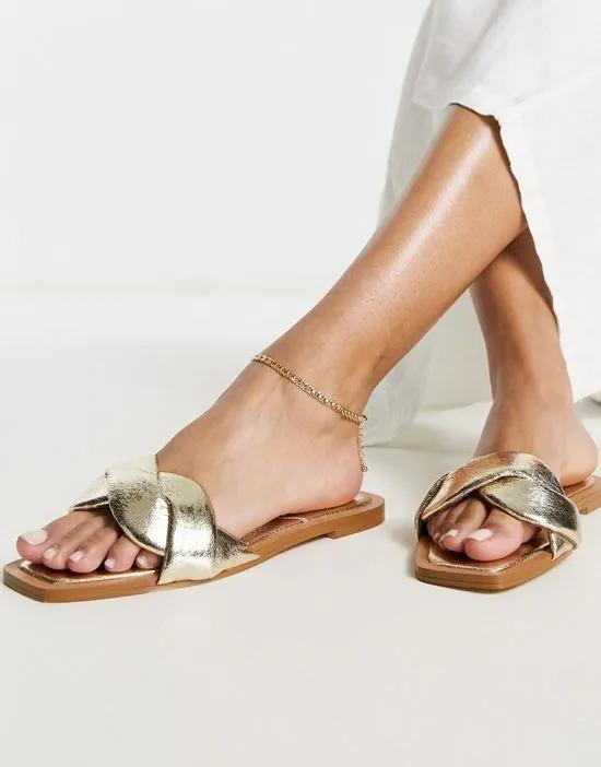 cross strap sandal in gold