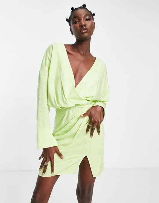 cuffed long sleeved satin mini dress with pleat detail skirt in lime green