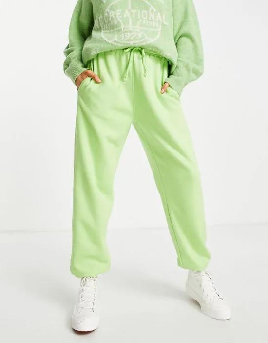 cuffed oversized sweats in bright green