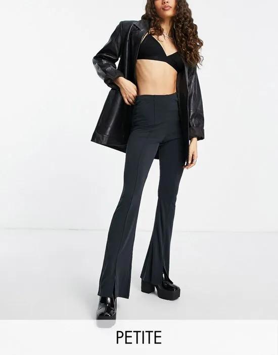 cupro flared pants with front slits in washed black