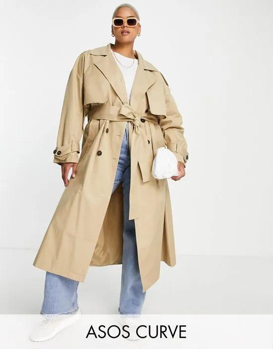Curve trench coat with tie in camel