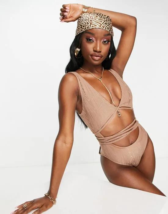 cut out wrap around swimsuit in textured rib in sand