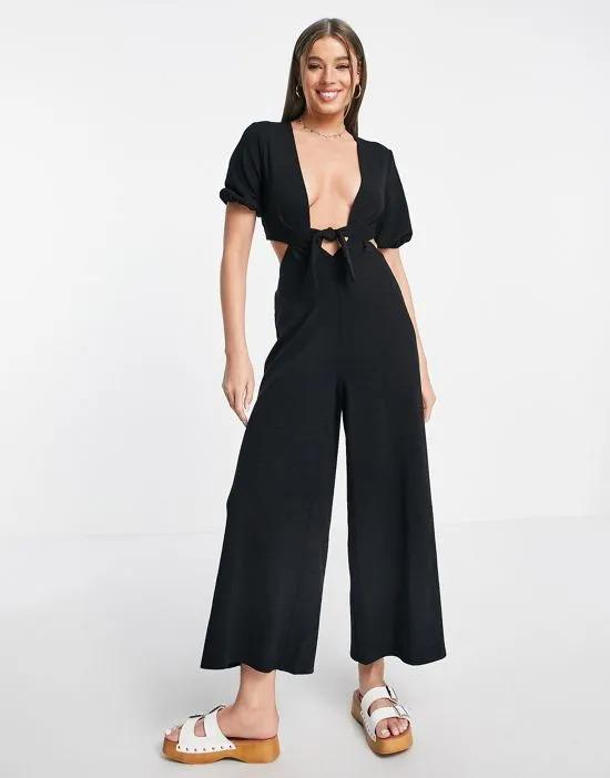 deep v jumpsuit with puff sleeve in black