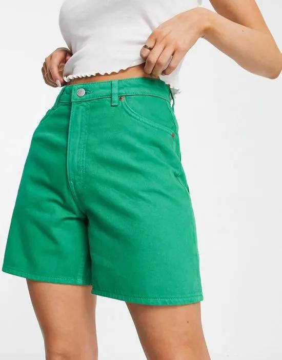 denim shorts in bright green