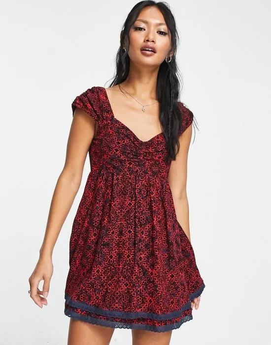 ditsy floral print mini smock dress in black and red