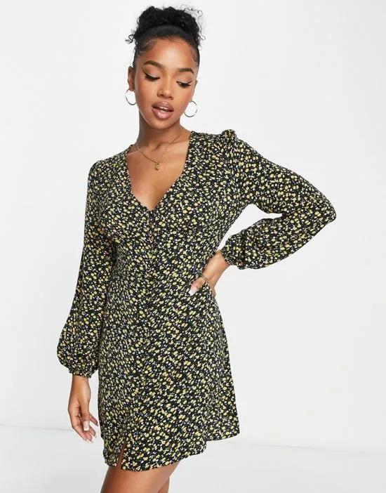 ditsy print plunge mini dress in black and yellow