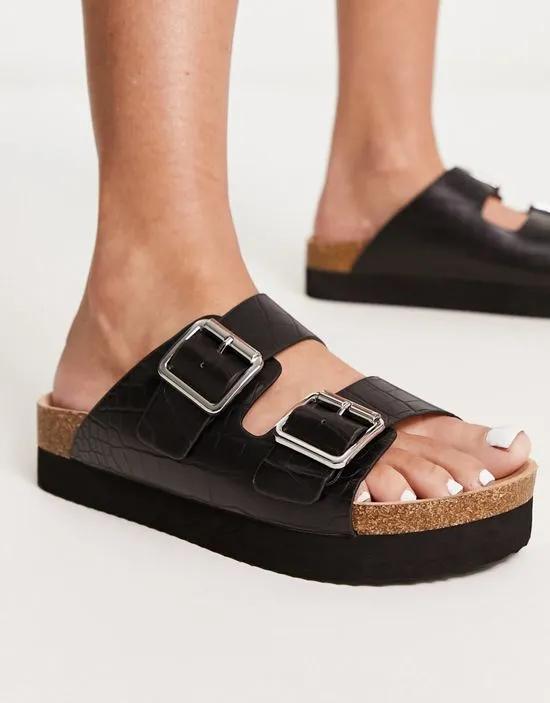 double strap flat croc sandals in black