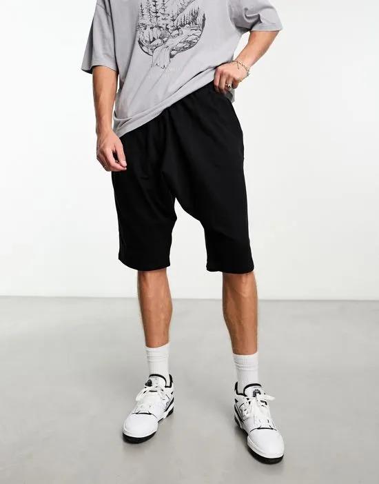 drop crotch jersey shorts in black