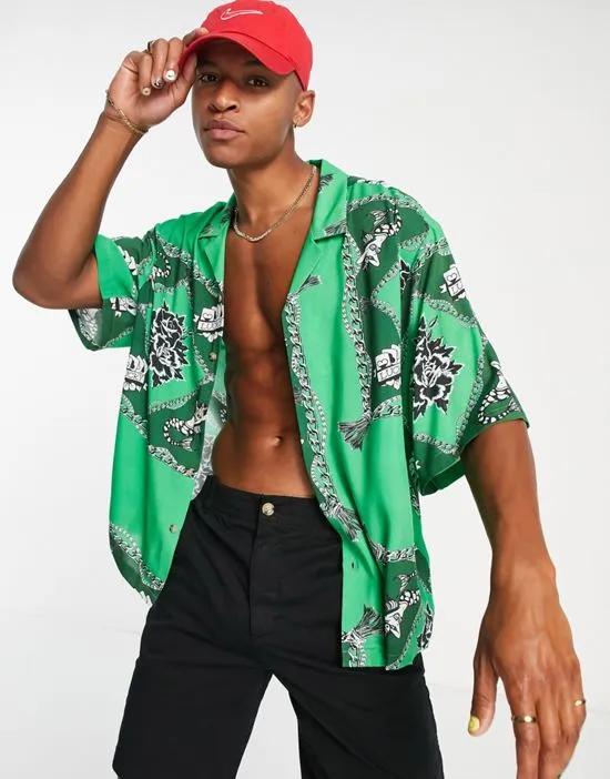 dropped shoulder oversized camp collar shirt in green rope print