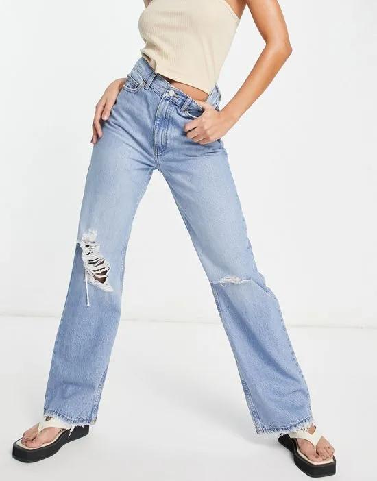 Echo straight leg jeans with rips in mid wash blue