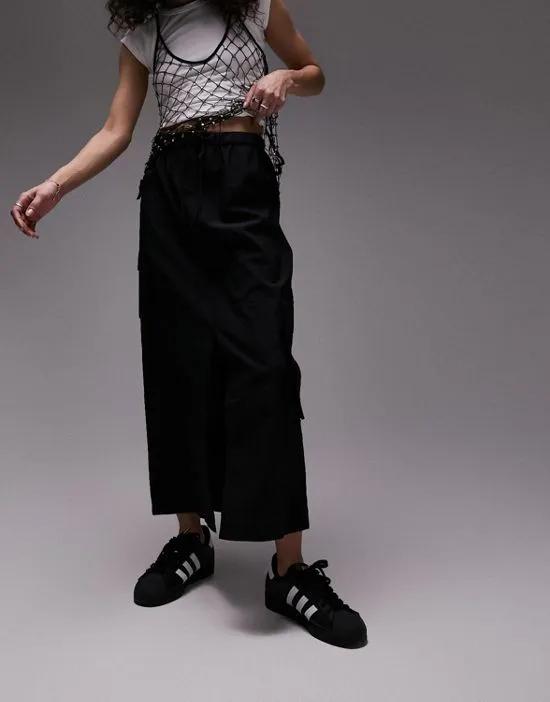elastic waist nylon midi skirt with pockets in black