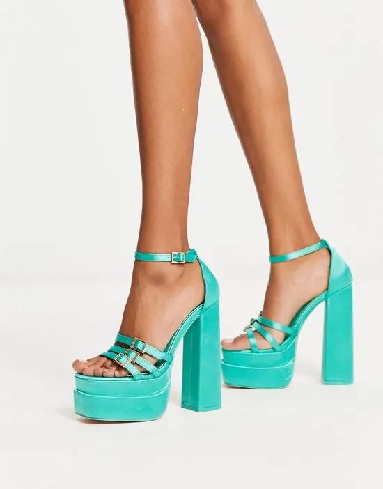 Elvya Exclusive platform heeled sandals in turquoise satin