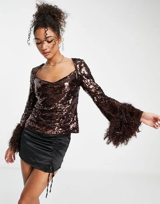 embellished long sleeve top with feather cuff & cowl neck detail in chocolate