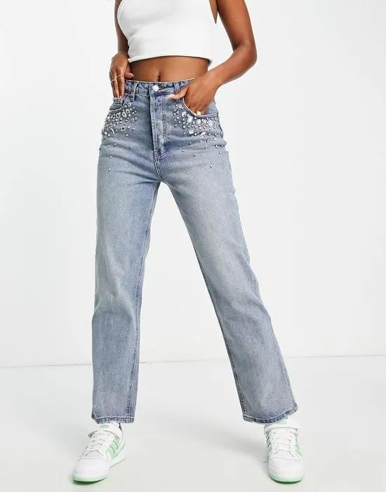 embellished pocket edge straight leg jeans in mid wash