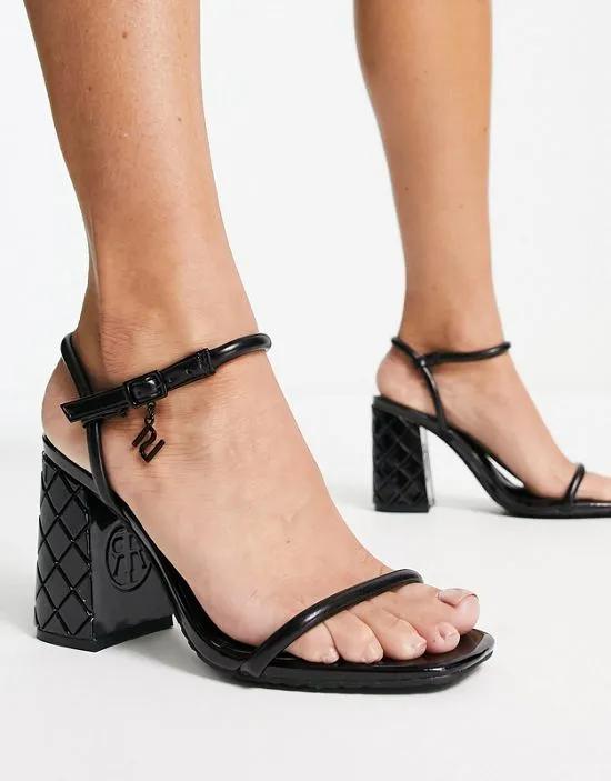 embossed block heeled sandals in black