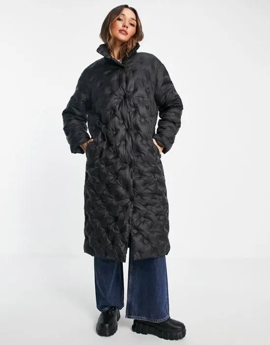 embossed puffer coat in black - BLACK