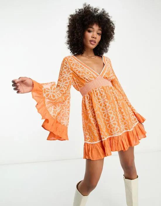 embroidered ruffle hem mini beach dress with floaty sleeves in orange