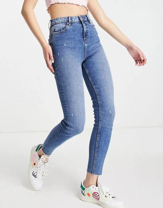 Emily high waist ankle grazer skinny jean in midwash blue