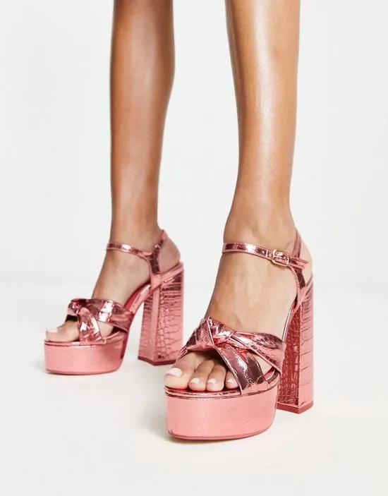 Exclusive Kiss platform heeled sandals in pink metallic