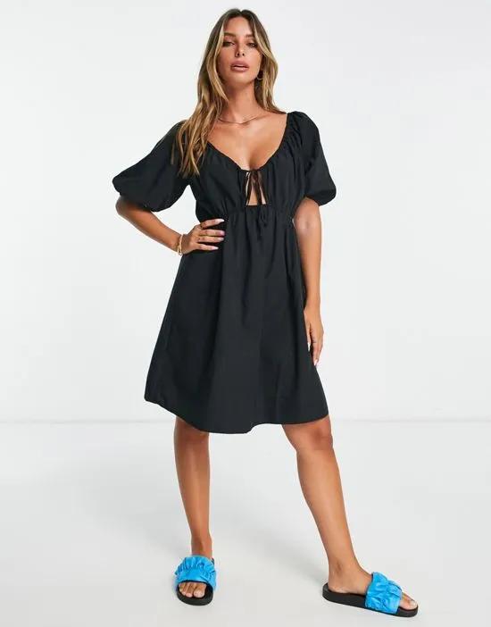 exclusive mini dress with cut out in black