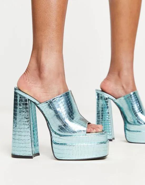 Exclusive platform mule sandals in blue croc metallic