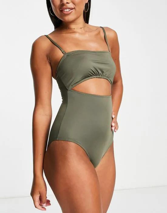 Exclusive ruched bandeau cut out swimsuit in khaki