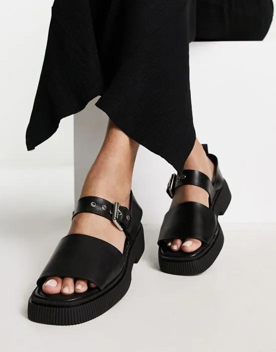 Exclusive Samba flat sandals with buckle strap in black leather