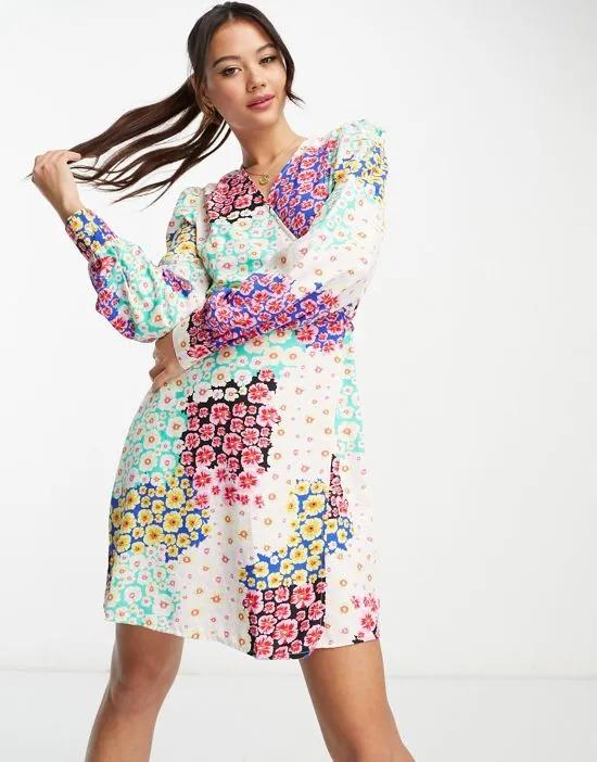 exclusive wrap mini dress in patchwork floral