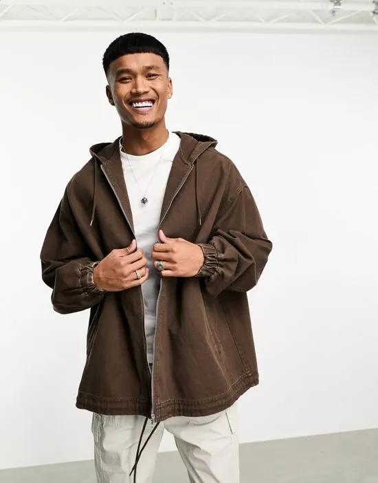 extreme oversized coach jacket in washed brown