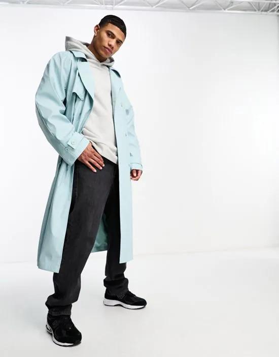 extreme oversized rubberized trench coat in blue
