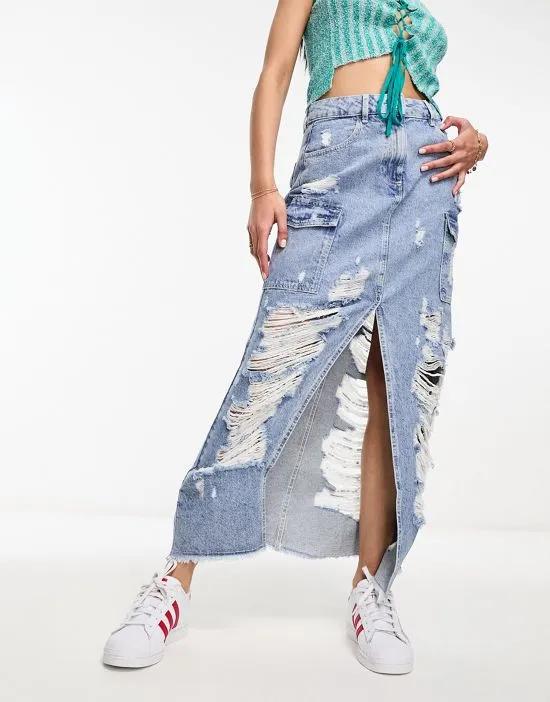 extreme ripped denim cargo skirt in light wash blue