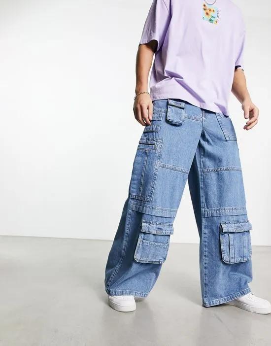 extreme wide leg cargo jeans with pockets in mid wash blue