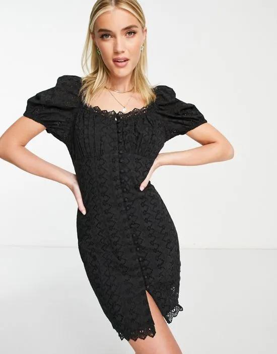 eyelet button through fitted mini dress in black