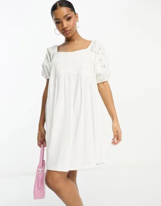 eyelet mini smock dress with curve seam in white