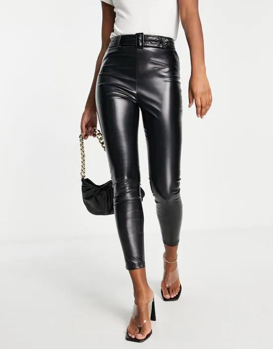 faux leather belted pants in black