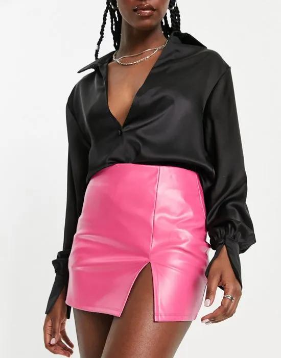 faux leather mini skirt with split detail in hot pink