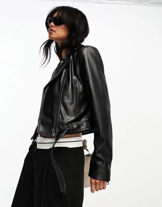faux leather shrunken moto jacket with belt in black
